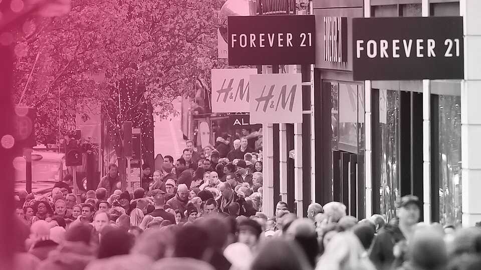 A shopping street showing the likes of fast fashion stores such as Forever 21 and H&M